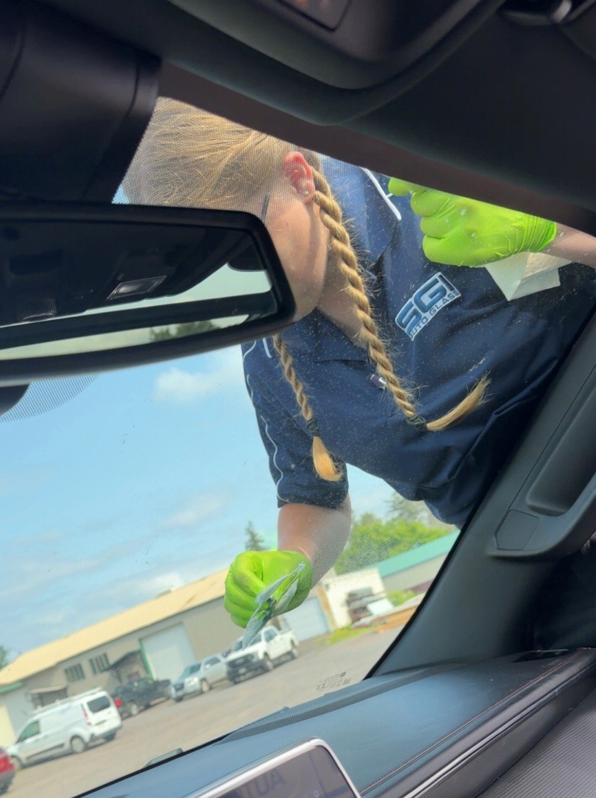 SGI technician repairing a windshield on location